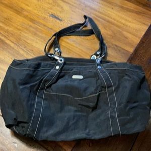 Baggallini brand bag. Tons of pockets and 4 compartments